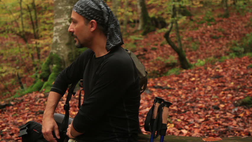 adventurer  take a break time and drinking water in the jungle