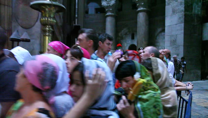 JERUSALEM - NOVEMBER 01: Christian pilgrims visit the the Rotunda and the Edicule in the Church of the Holy Sepulchre during visit to the holy land November 01 2012 in Old City Jerusalem, Israel