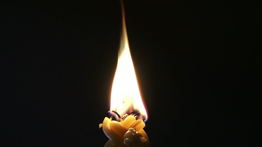 Burning candle close up