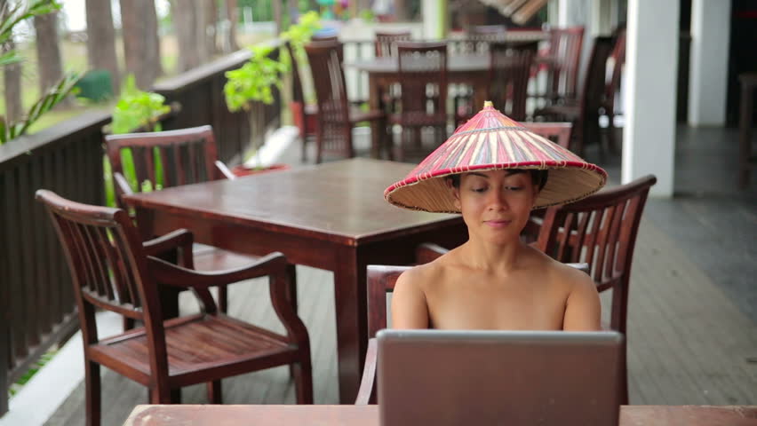 Asian freelance business woman at cafe with laptop 