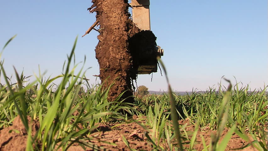 Pivot irrigation in progress on a wheat farm. (Timelapse)