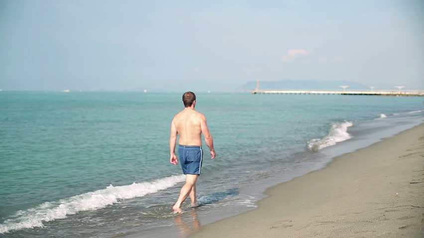 Man walking alone on the beach
