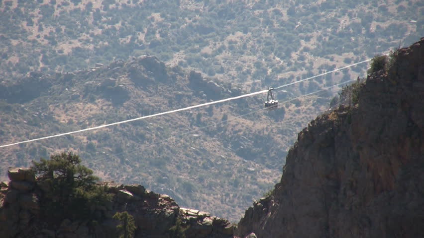 HD clip of the two cablecars of the Sandia Peak tram passing in the middle of the cable span