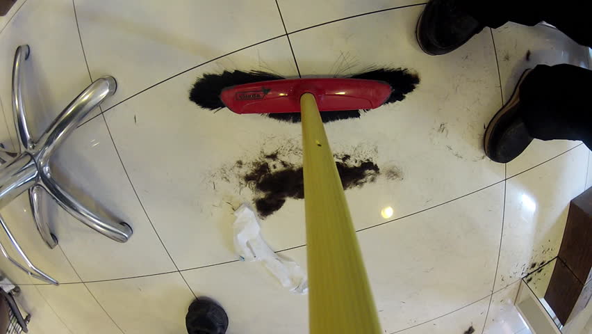 Sweepping hair

Description: Sweeping hair with a broom

