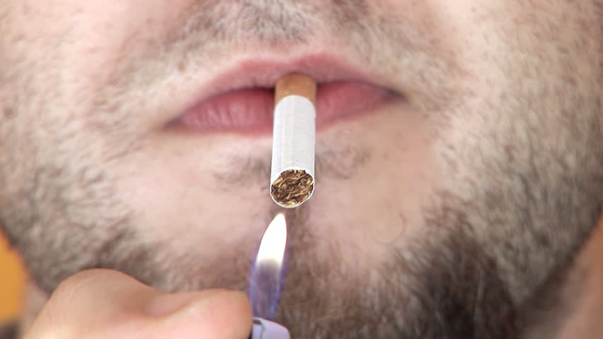 Lighting a cigarette close-up sharp as hell
