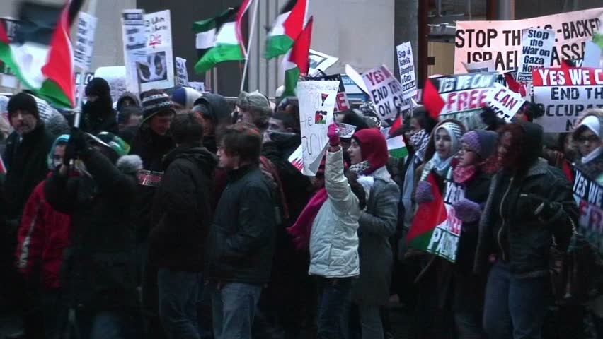 Chicago - 1/9/09 - Pro Hamas supporters with thousands of flags & signs march to the Chicago Israeli consulate shouting "Free Free Palestine" and "Long live Palestine"  etc. 