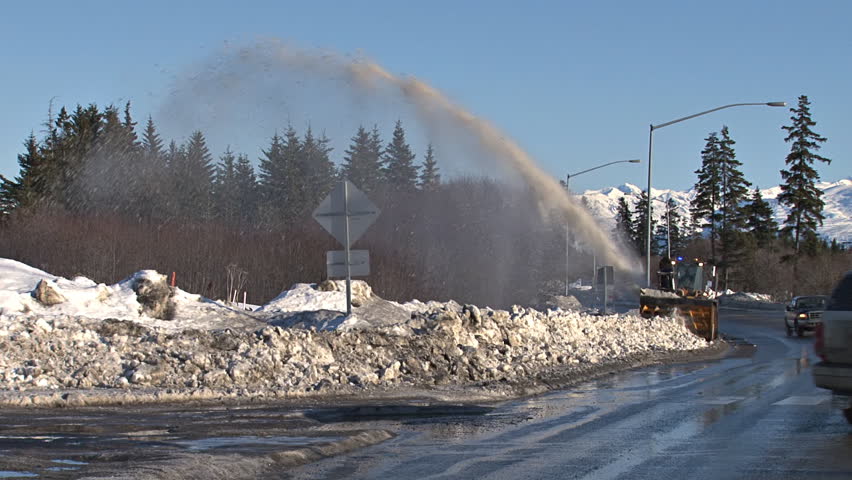 Winter Cleanup - Snow Blower on Sidewalk in Homer