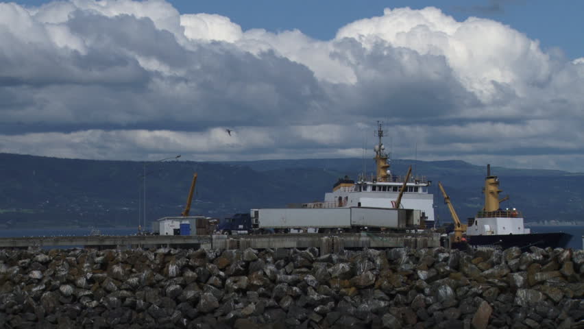 Semi Truck Hauling Fish From Tender at Dock