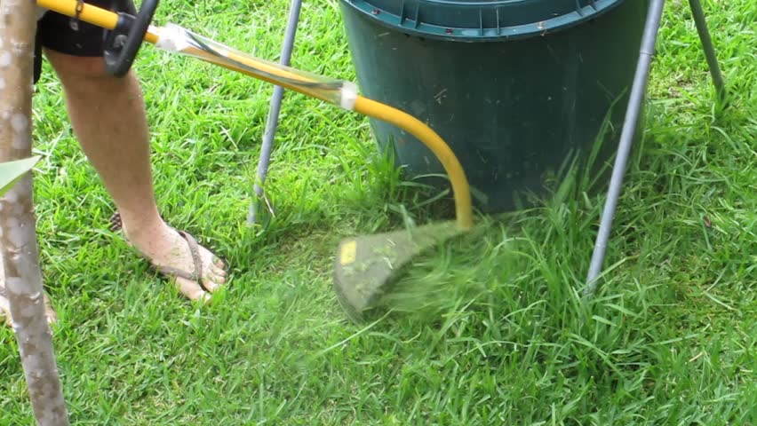 Man trimming Lawn Edge 1