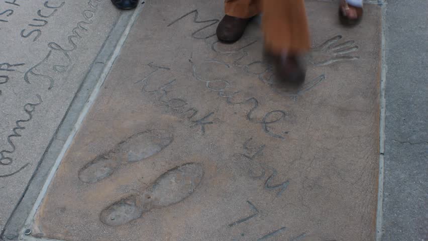 HOLLYWOOD, CA - CIRCA 2011: Eddie Murphy's hand and footprints at Grauman's Chinese Theater on Hollywood Boulevard in Hollywood, California.