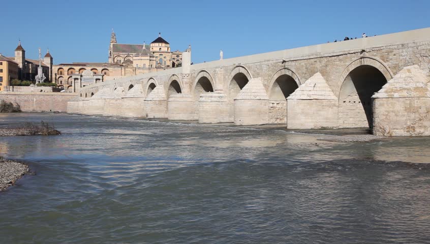 Roman Bridge with the Cathedral-Mosque of Cordoba in the background. Andalusia, Spain