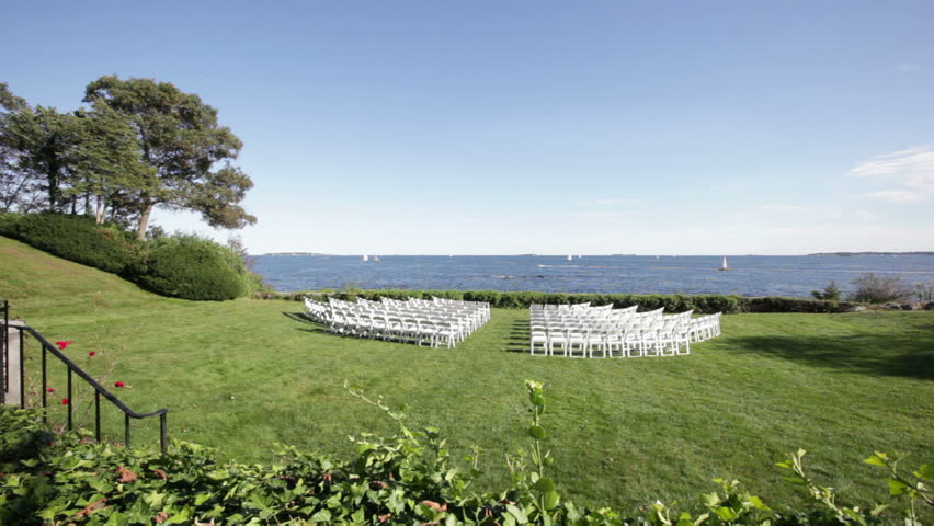 A wedding ceremony area along ocean before guests arrive 