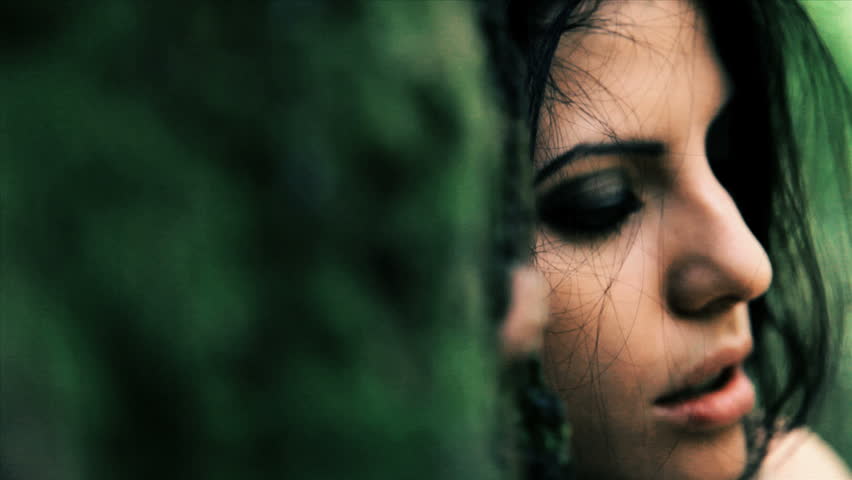 Desperate sad lonely woman alone in the dark