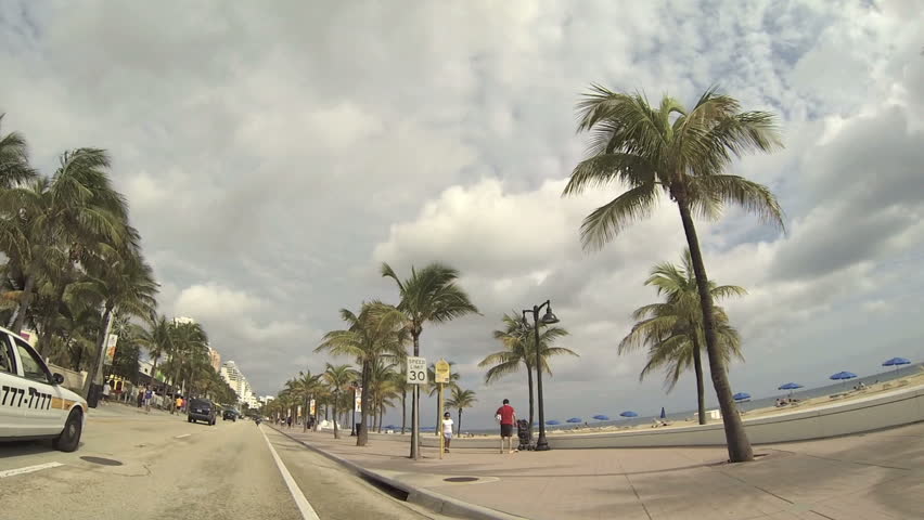 FORT LAUDERDALE - DEC 27: Driving on A1A in Fort Lauderdale Beach on December 27, 2012 in Fort Lauderdale, Florida, USA. A1A is the main road that runs by the beach and a popular tourist destination