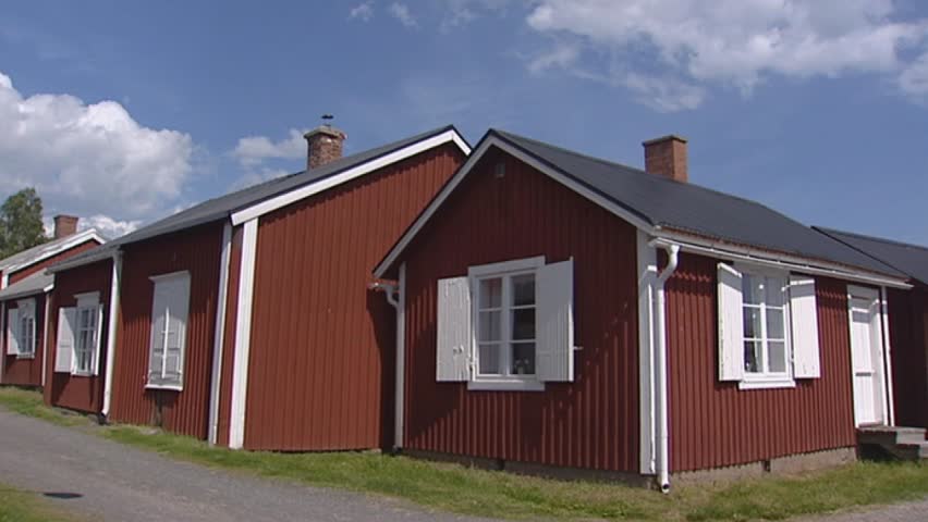 GAMMELSTAD LULEÃ, SWEDEN:  wooden huts Church village of Gammelstad pan church. Gammelstad is an old parish with a long history and is listed as World Heritage.