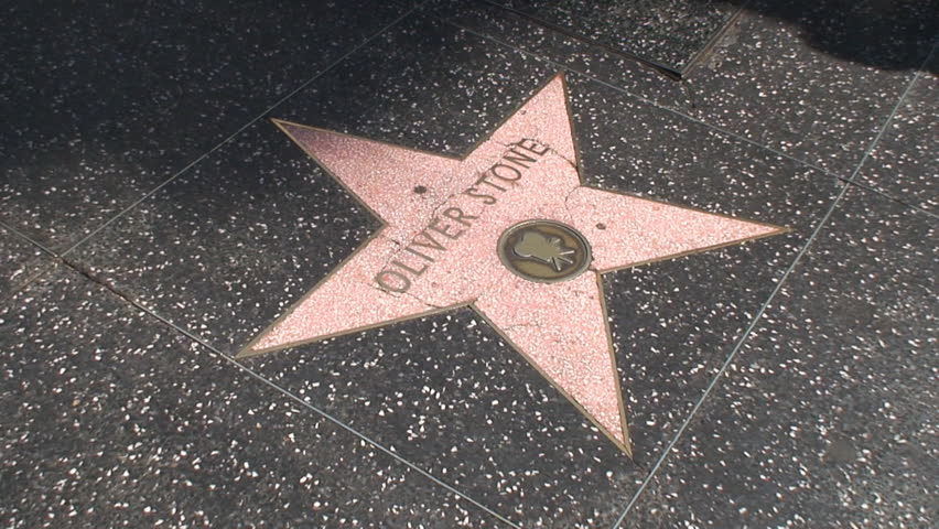 HOLLYWOOD, LOS ANGELES - CIRCA 2009: Tourists walking on Hollywood Walk of Fame in Hollywood, California. 