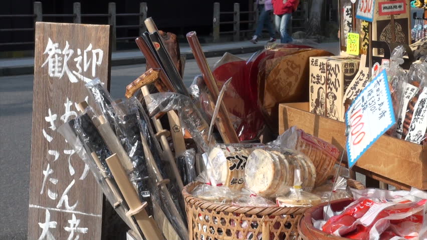 TAKAYAMA, JAPAN - 19 OCTOBER 2012: Souvenirs for sale at a roadside shop in Takayama, Japan