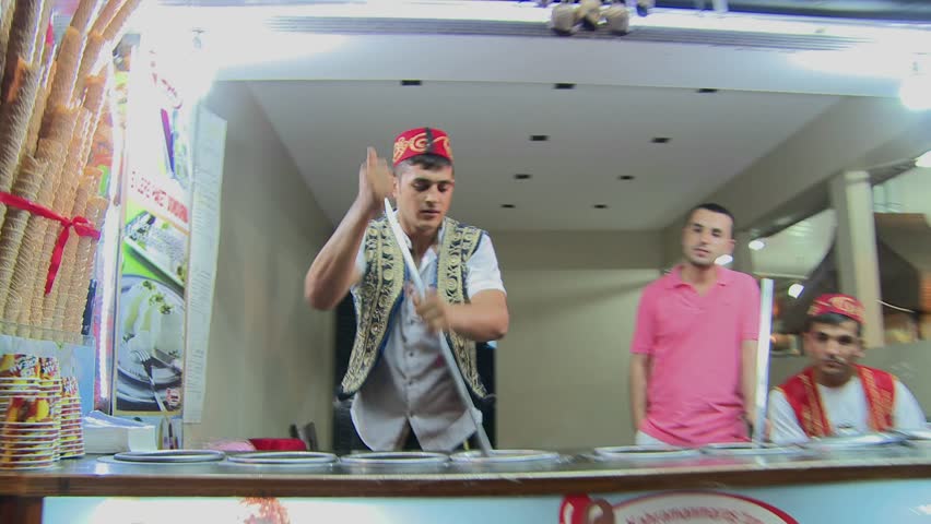 ISTANBUL, TURKEY 2012 A Turkish ice cream seller makes gooey ice cream in Istanbul.