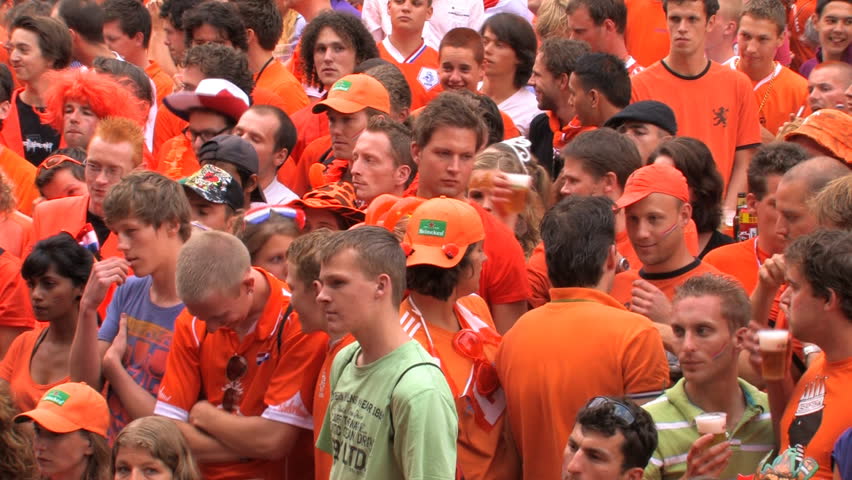 GRONINGEN, HOLLAND - JULY 11: Dutch soccer fans supporting their team during the final of the FIFA World Cup 2010 Netherlands vs. Spain - July 11, 2010 in Groningen, the Netherlands.