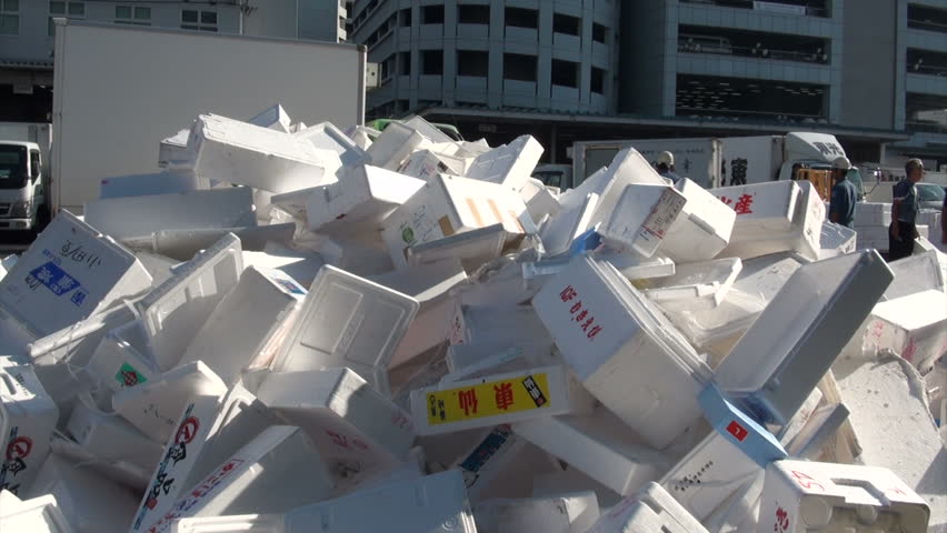 TOKYO, JAPAN - 7 NOVEMBER 2012: Clearing foam boxes at the Tsukiji fish market in Tokyo, Japan