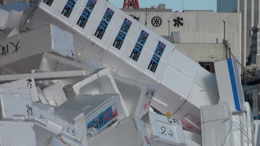 TOKYO, JAPAN - 7 NOVEMBER 2012: A fork lift is used to gather foam boxes for recycling at the Tsukiji fish market in Tokyo, Japan