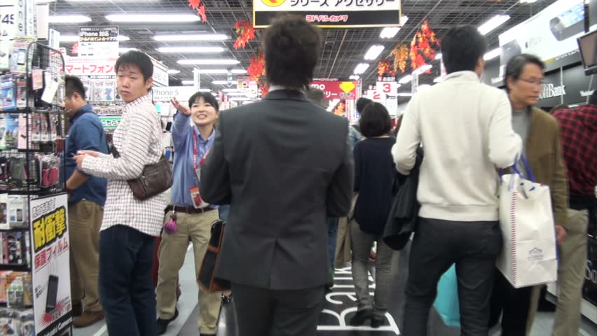 OSAKA, JAPAN - 26 OCTOBER 2012: Walking through a busy electronics store in Osaka, Japan