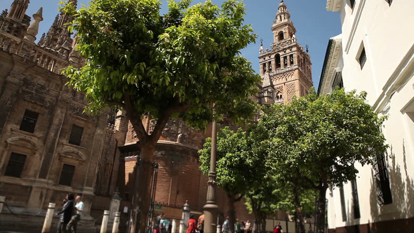 View of the famous Seville mosche with its Giralda minaret in a typical day