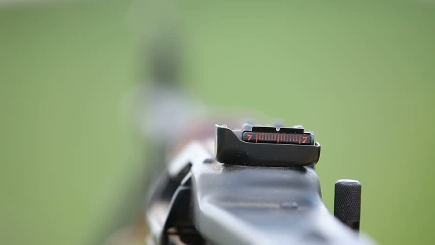 Close-up on automatic rifle.
Automatic rifle.
