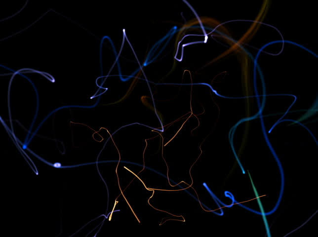 NTSC - Motion 112: Particles streak randomly drawing scribble (Loop).
