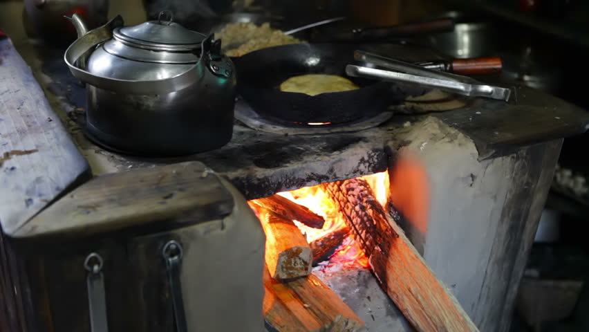 Traditional Himalayas Kitchen, wood fired placed into a old Mountain chalet. Shallow DOFF.