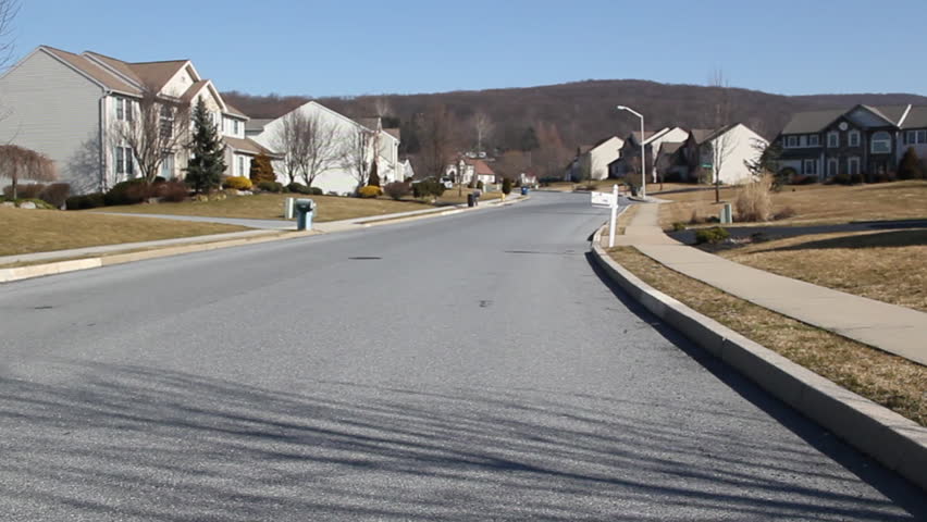 Driving through suburban neigborhood pov