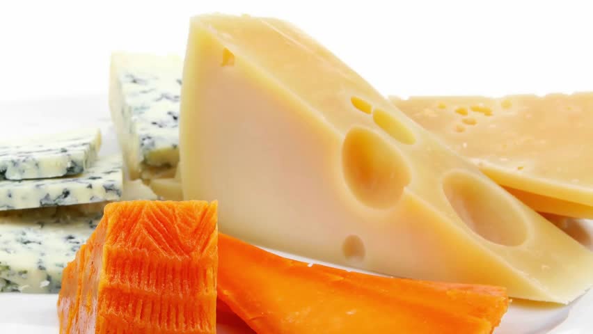 french delicatessen aged cheeses chops served on white plate with slices hidef slow motion intro
