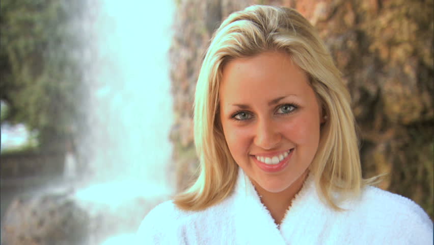Beautiful blonde girl enjoying spa luxury