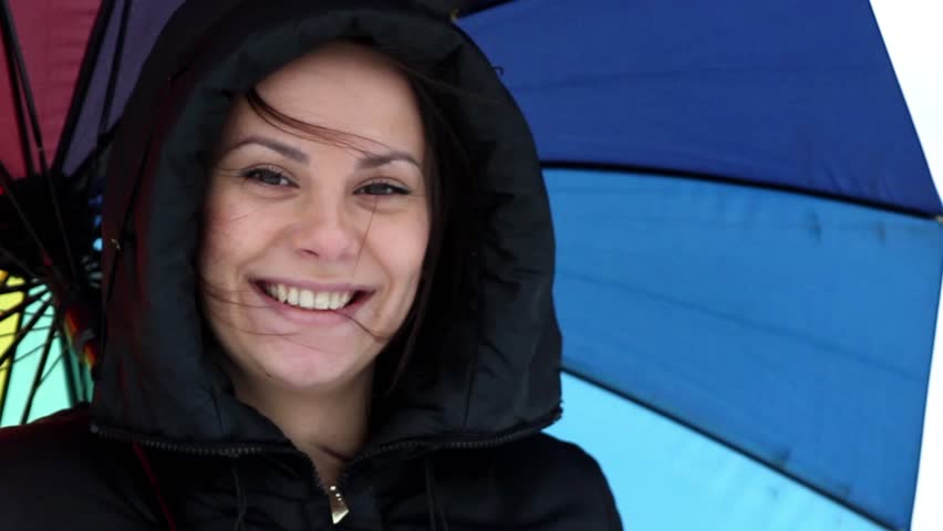 girl with umbrella,cheerful girl with a bright umbrella