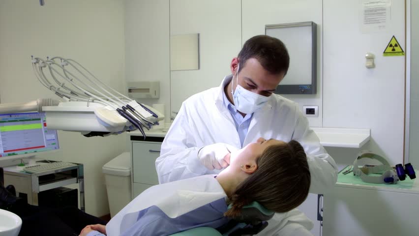 Dental care and hygiene, portrait of adult caucasian dentist at work and smiling at camera with customer sitting on exam chair. Sequence