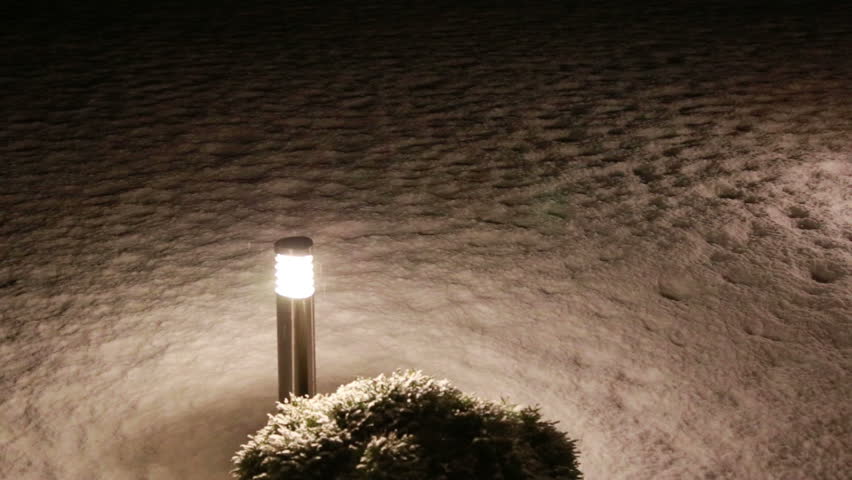 torch in falling snow in the night Full HD progressive video  SLR Canon 6d