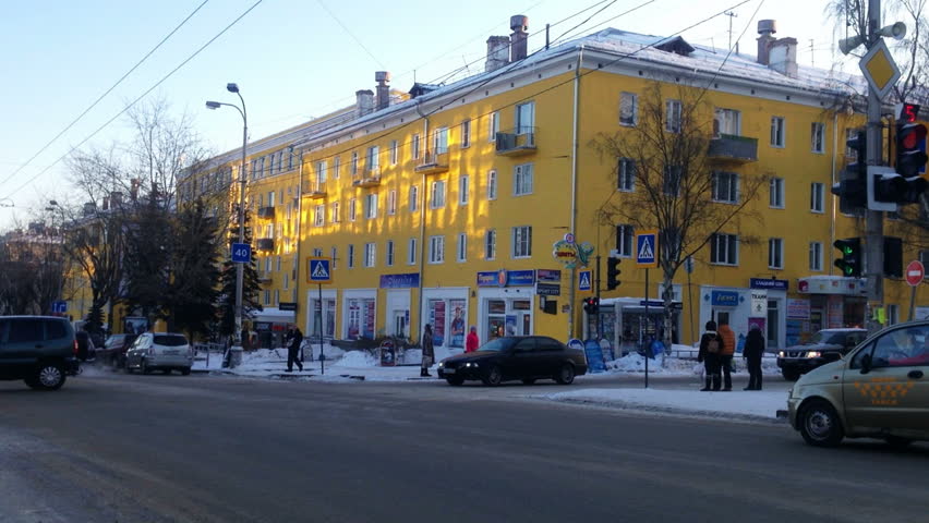 PETROZAVODSK, RUSSIA - JAN 25: City traffic in a sunny winter day on January,25, 2013, Petrozavodsk, Russia. Lenin prospect is the central street of Petrozavodsk, the capital of Karelia republic
