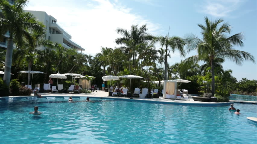 PUERTO VALLARTA, MEXICO NOV 2012: Mexican economy and tourism improves bringing increased income to business and resorts. Swimming pool luxury resort Mexico pan. 