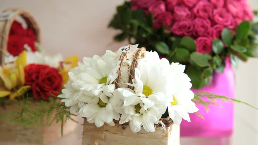 Fresh Flower Basket Arrangements In Florist Shop. Closeup, Tracking Shot