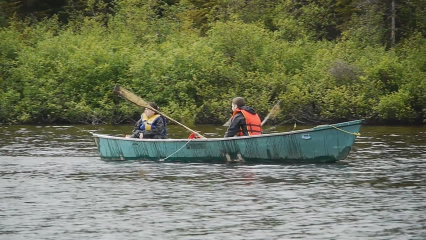 Couple fishing on a northern lake.