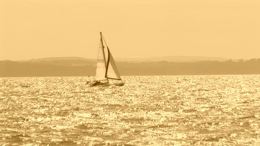Sailboat sailing with sepia background