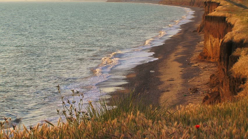 Picturesque seaside place at sunset.
Seaside.