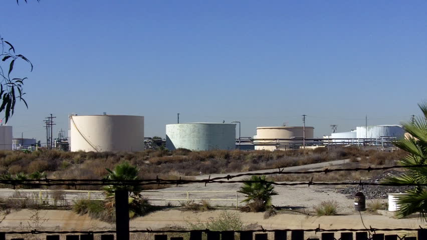 SANTA FE SPRINGS, CA - February 23, 2013: Aging oil storage tanks in an old refinery circa 2013 in Santa Fe Springs.California frequently has higher gas prices due to its aging petroleum refineries. 