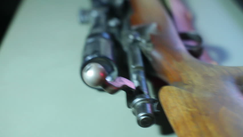 Guns at a gun show. 
Studio area, fake setup