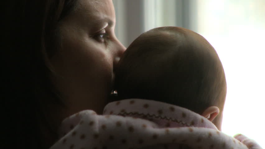 A two month old infant with its mother