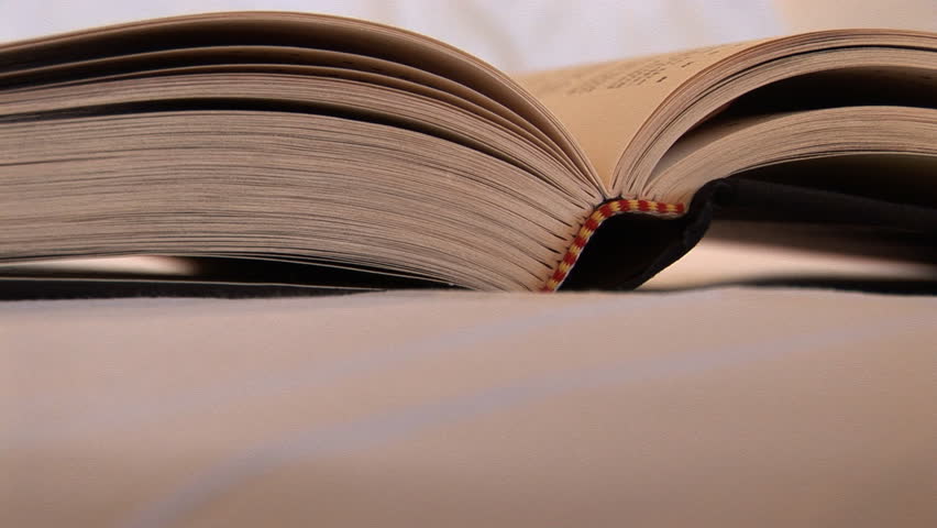 Open book on a bed, Seattle, Washington, zoom out