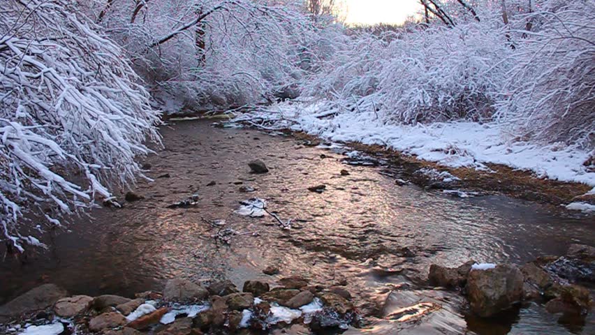 Willow Creek flows through Rock Cut State Park of Illinois on a snowy winter day