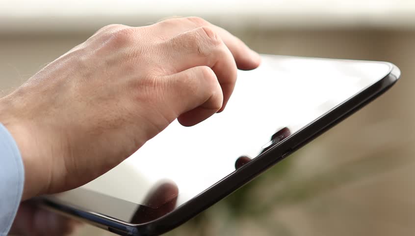Man pointing pad screen