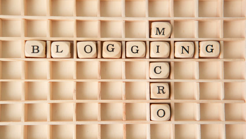 Micro blogging in a crossword shape dispersing in stop motion
