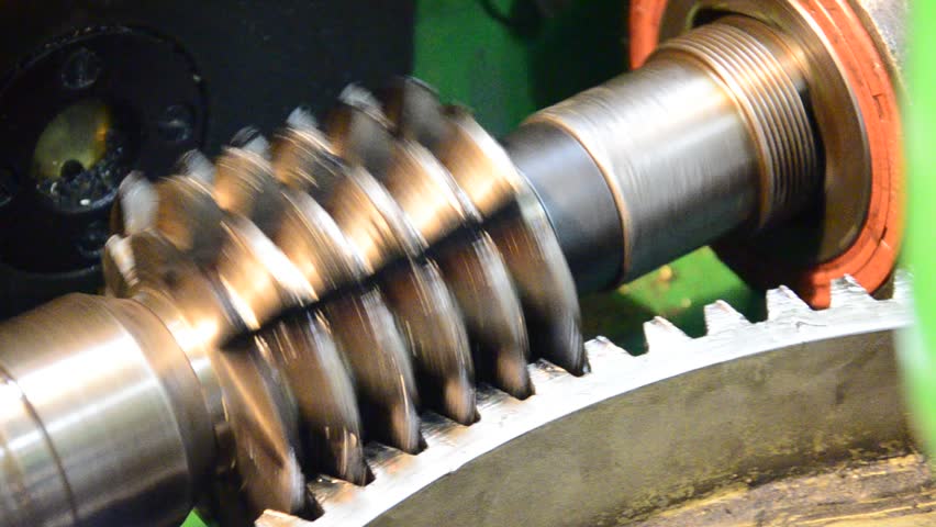 wormwhee gear, cogwheel production and service industrial machine, rotating gears extreme closeup view